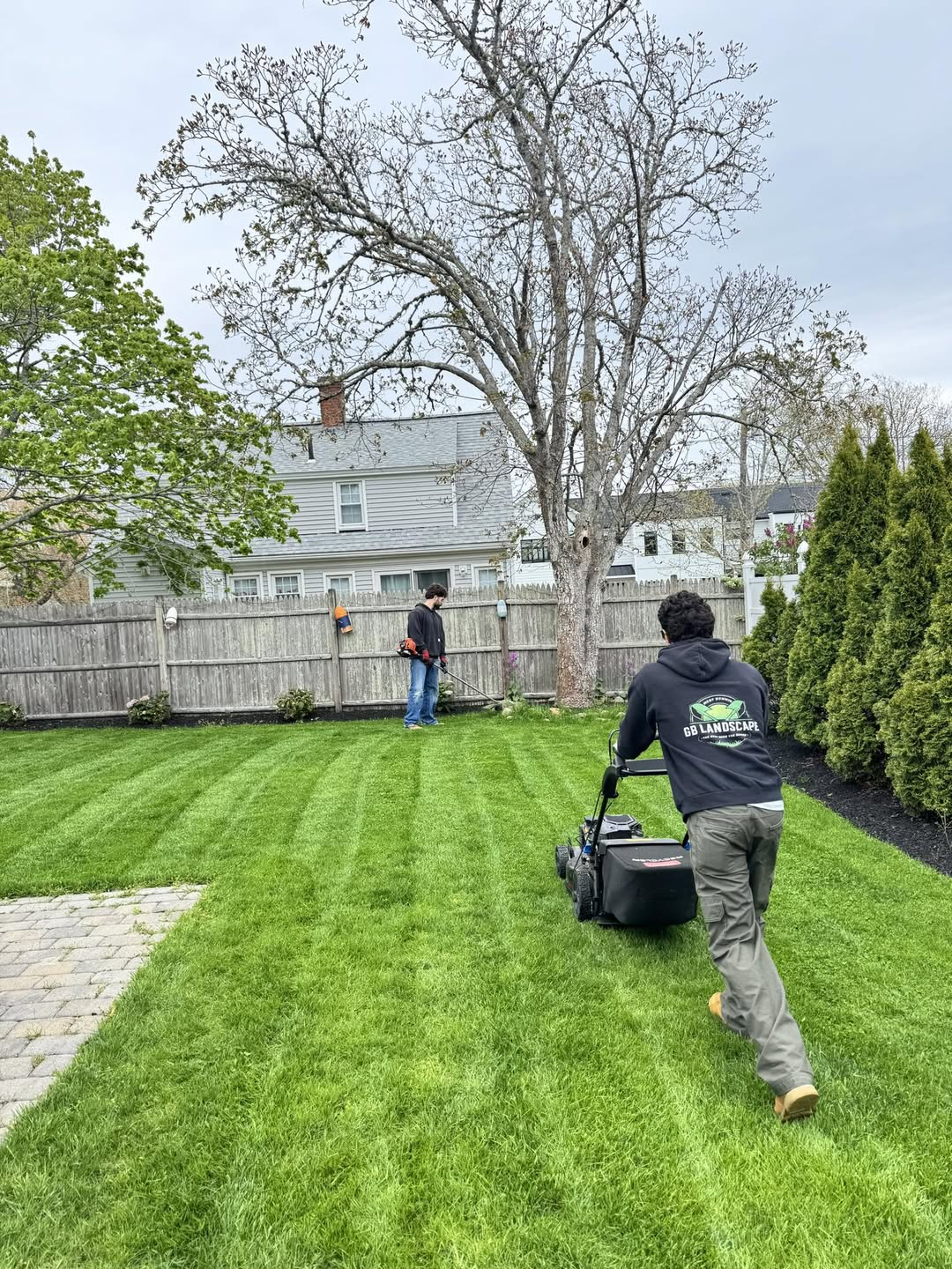 Crew mowing a lawn