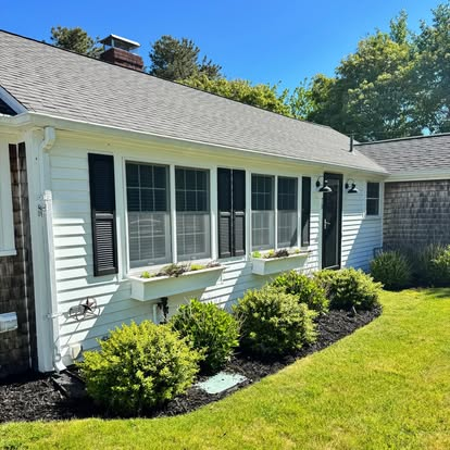 Fresh black mulch around a home